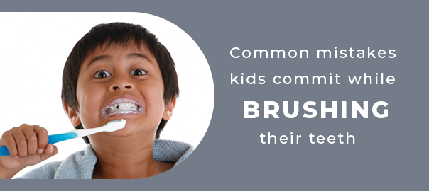 Child learning to brush teeth correctly